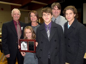 Sam Lamb, left, nominated Derek Partlo to the Tillsonburg Sports Hall of Fame. Partlo, back row, is joined here by his family after Sunday's Hall of Fame ceremony. CHRIS ABBOTT/TILLSONBURG NEWS