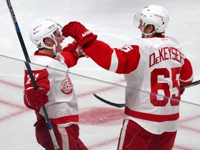 Dylan Larkin celebrates a goal against the Canadiens last week with teammate Danny DeKeyser. (USA TODAY SPORTS)