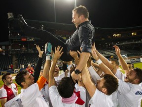 Fury FC lift their coach Marc Dos Santos after clinching the fall championship with a 3-1 will against the Jacksonville Armada Wednesday night. JACKSONVILLE ARMADA/PHOTO