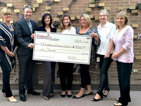 Festival of Giving committee members (from left to right): Marnie Ball, Darrin Evans, Tina Evans, Shelby Sanchuk, Toni Martin, Cindy Gillett, Donna Litwin-Makey. They announced $80,000 from their spring fundraiser will be going to local charities.