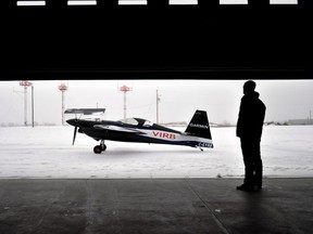 Red Bull Air Race World Championship Pilot Pete McLeod and his freshly painted Edge 540 aircraft in London Ont. Jan. 16, 2015. CHRIS MONTANINI\LONDONER\QMI AGENCY