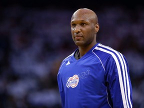 This Jan. 2, 2013 file photo shows Los Angeles Clippers' Lamar Odom (7) in action against the Golden State Warriors during an NBA basketball game in Oakland, Calif. Authorities say former NBA and reality TV star Odom has been hospitalized after he was found unconscious at a Nevada brothel. Nye County Sheriff Sharon A. Wehrly says the department got a call Tuesday afternoon, Oct. 13, 2015, requesting an ambulance for an unresponsive man at the Love Ranch in Crystal, Nevada about 70 miles outside of Las Vegas.  (AP Photo/Marcio Jose Sanchez, File)