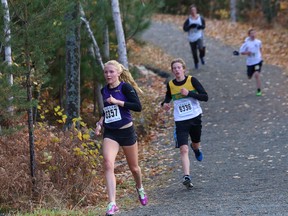 Competitors take part in the local high school cross-country running championship in the midget boys and senior girls divisions at the trails at Laurentian University in Sudbury, Ont. on Thursday October 22, 2015.