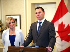 Premier Rachel Notley welcomes MLA Deron Bilous as Minister of Economic Development and Trade at Government House in Edmonton, Alta., on October 22, 2015. Perry Mah/Edmonton Sun/Postmedia