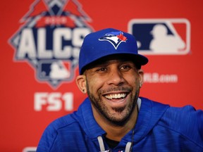 Blue Jays starting pitcher David Price smiles during a news conference at Kauffman Stadium in Kansas City, Mo., on Thursday, Oct. 22, 2015. Price will start in Game 6 of the ALCS on Friday. (Orlin Wagner/AP Photo)