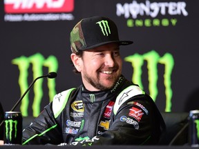 Kurt Busch, driver of the No. 41 Stewart-Haas Racing Chevrolet, looks on during a news conference announcing Monster Energy as a co-sponsor. Monster Energy will team with Busch for a multi-year deal and could be a terrific fit for the controversial driver. (AP/PHOTO)