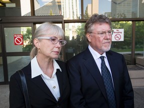 Gayska and Richard Suter listen while lawyer Dino Bottos speaks to the media outside of Court of Queen’s Bench in Edmonton on June 5 after Suter pleaded guilty to the charge of refusing to provide a breath sample related to the death of Geo Mounsef. (FILE PHOTO)