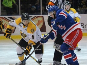 Sarnia Sting centre Troy Lajeunesse and Kitchener Rangers pivot Gustaf Franzen face off during the Ontario Hockey League game at the Sarnia Sports and Entertainment Centre Thursday night. Kitchener won 6-3. (Terry Bridge/Sarnia Observer/Postmedia Network)