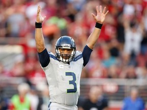 Russell Wilson of the Seattle Seahawks reacts to a play against the San Francisco 49ers during their NFL game at Levi's Stadium in Santa Clara on Oct. 22, 2015. (Ezra Shaw/Getty Images/AFP)