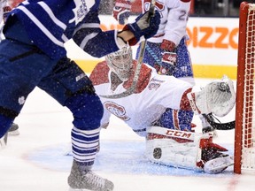 Montreal Canadiens goalie Carey Price makes a pad save against the Toronto Maple Leafs during second period NHL action in Toronto on Wednesday, Oct. 7, 2015. THE CANADIAN PRESS/Frank Gunn