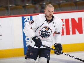 This Feb. 6, 2010, file photo shows Edmonton Oilers center Patrick O'Sullivan warming up before facing the Colorado Avalanche in an NHL hockey game in Denver. Former NHL player O'Sullivan is opening up about years of abuse at the hands of father (THE CANADIAN PRESS/AP/David Zalubowski)