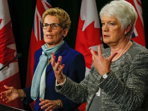 Ont. Premier Kathleen Wynne, along with Education Minister Liz Sandlas, address media after meeting with the Teachers Union at Queens Park, in Toronto, Ont.on Friday October 23, 2015. Dave Thomas/Toronto Sun/Postmedia Network