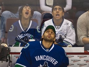 You won’t catch a Maple Leafs backup goaltender looking at replays or funny skits on the videoboard, as Roberto Luongo did when he was with Vancouver. Head coach Mike Babcock gets the spare netminder to chart faceoffs. (ANDY CLARK/Reuters files)