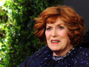 This Nov. 8, 2014 file photo Maureen O'Hara arrives at the 6th annual Governors Awards at the Hollywood and Highland Center in Los Angeles. (Photo by Chris Pizzello/Invision/AP, File)