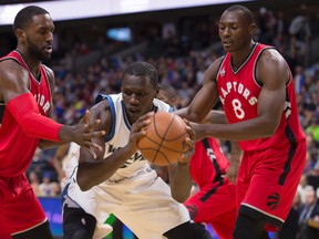 Raptors power forward Patrick Patterson (left) has been good defensively in the pre-season, but struggled mightily on offence. (CANADIAN PRESS)