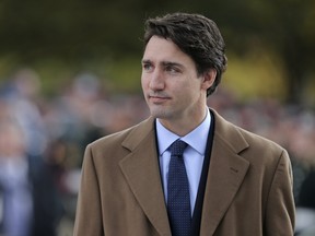 Prime Minister-designate Justin Trudeau arrives at a ceremony to commemorate the October 2014 attack on Parliament Hill, at the National War Memorial in Ottawa, Canada October 22, 2015. (REUTERS/Chris Wattie)