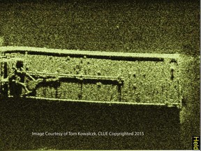 This undated image provided by Tom Kowalczk and created with a side scan sonar shows a sunken barge in Lake Erie. Underwater contractors are being sent to Lake Erie to search for the source of what appears to be a petroleum leak coming from the barge found recently in the lake near the U.S.-Canadian border, the U.S. Coast Guard said Sunday, Oct. 25, 2015. (Tom Kowalczyk via AP)