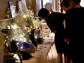 Gala attendees check out thousands of dollars worth of silent auction items, from spa-days to wine packages and cooking tools to hockey jerseys, during the Trenton Memorial Hospital Foundation Une Soiree Blanche ... A Winter's Eve gala on Saturday.