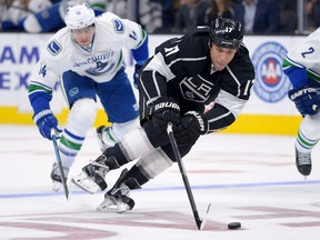 Oct 13, 2015; Los Angeles, CA, USA;  Los Angeles Kings left wing Milan Lucic (17) chases down the puck in the second period of the game against the Vancouver Canucks at Staples Center. Mandatory Credit: Jayne Kamin-Oncea-USA TODAY Sports