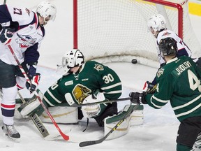 Windsor's Hayden McCool watches as the puck goes past London goalie Emanuel Vella in the first period of OHL action between the Windsor Spitfires and the visiting London Knights at the WFCU Centre, Sunday, Oct. 25, 2015.   (DAX MELMER/The Windsor Star)