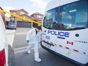 Peel Regional Police at the scene of homicide investigation on Southfork Dr in Mississauga on Sunday. (ERNEST DOROSZUK, Toronto Sun)