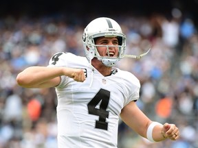 Derek Carr of the Oakland Raiders celebrates his touchdown pass to Clive Walford during the second quarter against the San Diego Chargers at Qualcomm Stadium in San Diego on Oct. 25, 2015. (Harry How/Getty Images/AFP)