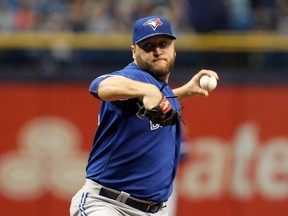 Mark Buehrle of the Toronto Blue Jays pitches during the first inning of game between the Tampa Bay Rays and the Toronto Blue Jays at Tropicana Field in St. Petersburg on Oct. 4, 2015. (Scott Iskowitz/Getty Images/AFP)