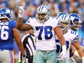Greg Hardy #76 of the Dallas Cowboys celebrates a sack during the second quarter against the New York Giants at MetLife Stadium on October 25, 2015 in East Rutherford, New Jersey.   Elsa/Getty Images/AFP