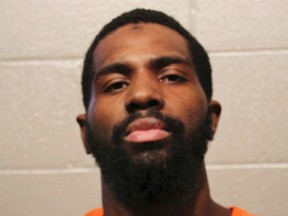 This Oct. 1, 2014, file photo provided by the Cleveland County, Okla., Sheriff's Department shows Alton Nolen, who has been charged in the Sept. 25, 2014, beheading death of his co-worker, Colleen Hufford, at a food processing plant in Moore, Okla. An Oklahoma judge will convene a non-jury trial scheduled to begin Monday, Oct. 26, 2015, to determine whether Nolen is mentally competent to be tried for first-degree murder.  (Cleveland County Sheriff's Department via AP, File)