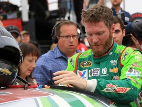 Dale Earnhardt Jr., driver of the #88 Diet Mountain Dew Chevrolet, reacts on pit road after the NASCAR Sprint Cup Series CampingWorld.com 500 at Talladega Superspeedway in Talladega, Ala., on Sunday, Oct. 25, 2015. (Jerry Markland/Getty Images/AFP)
