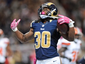 Todd Gurley #30 of the St. Louis Rams celebrates after making a touchdown against the Cleveland Browns in the third quarter at the Edward Jones Dome on October 25, 2015 in St. Louis, Missouri.   Michael B. Thomas/Getty Images/AFP