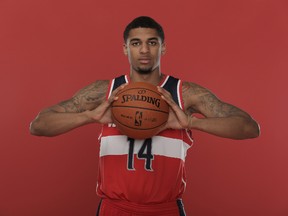 Glen Rice Jr. of the Washington Wizards poses for a portrait during the 2013 NBA rookie photo shoot at the Madison Square Garden Training Facility in Tarrytown, New York, on Aug. 6, 2013. (Shem Roose/NBAE via Getty Images/AFP)
