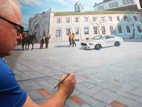 Local artist Pat Shea adds the finishing touches to a large 4’ x 6’ oil painting he is donating to the Kingston Police Force as part of his Thank You series to emergency services and military. The donation coincides with the  commemoration of the Kingston Police Force's 175th anniversary. (Julia McKay/The Whig-Standard)