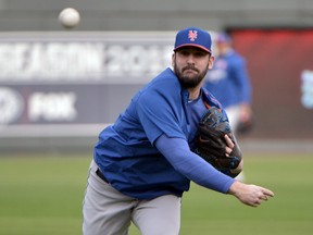 New York Mets starting pitcher Matt Harvey delivers a pitch during workouts the day before Game 1 of the 2015 World Series against the Kansas City Royals at Kauffman Stadium on Oct. 26, 2015. (Denny Medley/USA TODAY Sports)