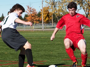 NCC vs. SPSS in semi-final play at the BQ junior boys soccer championships Monday at MAS Park. (Isaac Paul for The Intelligencer)