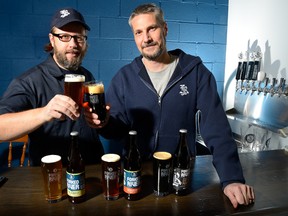 After months of wrangling with the Ontario Government, Dave Reed, left, and Andrew Peters, co-owners of the Forked River Brewing Company, will open a retail store at the location of their Pacific Court brewery in London. (MORRIS LAMONT, The London Free Press)