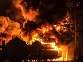 Smoke and flames shoot up as boats burn at the Port Elgin, Ont., harbour early Tuesday morning.  (Photo courtesy Michael Johnson)