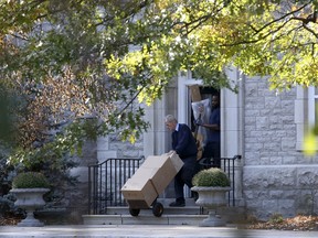 Movers carry items from 24 Sussex, the official residence of Canada's prime minister, in Ottawa October 27, 2015. Justin Trudeau will be sworn in as Canada's 23rd prime minister on November 4 after his Liberal party defeated Stephen Harper's Conservative party in the October 19 election. REUTERS/Chris Wattie