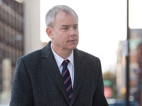 Dennis Oland arrives at the Law Courts as his murder trial continues in Saint John on Wednesday, Oct. 21, 2015. THE CANADIAN PRESS/Andrew Vaughan