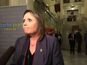 Helen Clease, president of the Alberta School Boards Association, speaks at the Legislature rotunda on Tuesday, Oct. 27, reacting to the budget.