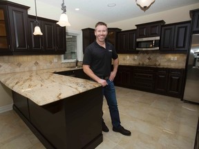 Mike Hodgson, in a renovated kitchen in London, heads Old Castle Renovations, which won the Better Business Bureau?s integrity award for small companies on Tuesday. (DEREK RUTTAN, The London Free Press)
