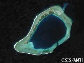 Subi reef, located in the disputed Spratly Islands in the South China Sea, is shown in this handout Center for Strategic and International Studies (CSIS) Asia Maritime Transparency Initiative satellite image taken August 8, 2012, and released to Reuters October 27, 2015. A U.S. guided-missile destroyer sailed close to one of China's man-made islands in the South China Sea on October 27, 2015, drawing an angry rebuke from Beijing, which said it had tracked and warned the ship and called in the U.S. ambassador to protest. REUTERS/CSIS Asia Maritime Transparency Initiative/DigitalGlobe/Handout via Reuters