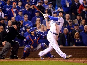 Kansas City Royals first baseman Eric Hosmer (35) drives in the winning run with a sacrifice fly against the New York Mets in the 14th inning in game one of the 2015 World Series at Kauffman Stadium. Mandatory Credit: Jeff Curry-USA TODAY Sports