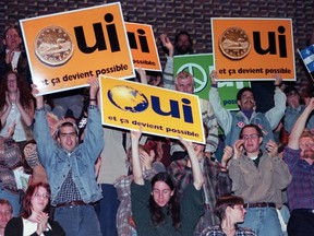 Yes supporters cheer during a speech by Bloc Quebecois Leader Lucien Bouchard at a junior college in Montreal Tuesday, Oct. 24, 1995. (THE CANADIAN PRESS/Ryan Remiorz)