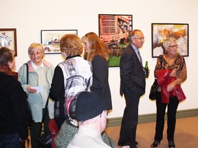 The crowd mingles during the reception.