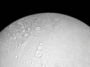 The north pole of Saturn's icy moon Enceladus is seen in an image from NASA's Cassini spacecraft taken October 14, 2015. The moon's north pole lies approximately at the top of this view from Cassini's wide-angle camera. The view was acquired at a distance of approximately 4,000 miles (6,000 kilometers) from Enceladus.  (REUTERS/NASA/JPL-Caltech/Space Science Institute/Handout via Reuters)