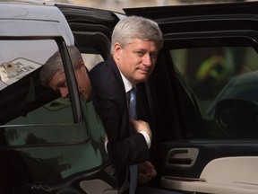 Outgoing prime minister Stephen Harper arrives at his Langevin office in Ottawa, Wednesday, Oct. 21, 2015. Harper will formally step down next week, just before Justin Trudeau's Liberal government takes office. THE CANADIAN PRESS/Adrian Wyld