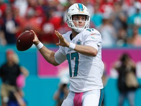 In this Sunday, Oct. 25, 2015, file photo, Miami Dolphins quarterback Ryan Tannehill looks to pass during the first half of an NFL football game against the Houston Texans in Miami Gardens, Fla. (AP Photo/Joel Auerbach, File)