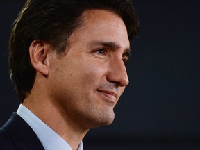 Prime minister-designate Justin Trudeau speaks at the National Press Theatre to during a press conference in Ottawa on Tuesday, October 20, 2015. (THE CANADIAN PRESS/Sean Kilpatrick)