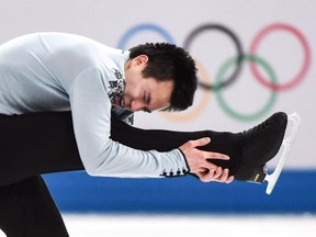 Canada’s Patrick Chan performs his men’s free program at the Sochi Olympics Friday, February 14, 2014 in Sochi. (THE CANADIAN PRESS/Paul Chiasson)